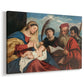 Canvas art print featuring a religious scene with saints flanking mother and child, displayed at an angle