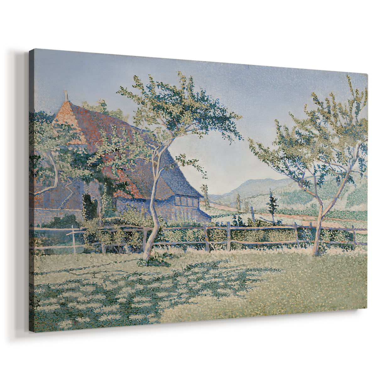 Canvas art print featuring a pointillist countryside scene with architecture and open field, displayed at an angle