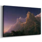 Canvas art print featuring a dramatic scene combining figure and rugged terrain, displayed at an angle