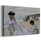 Canvas art print featuring an impressionist seaside scene with women in dresses and hats, displayed at an angle