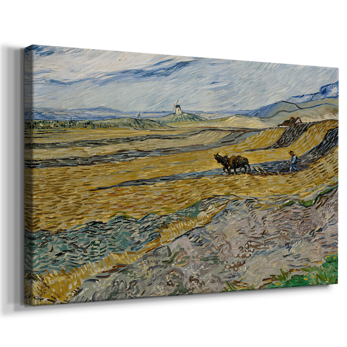 Canvas art print featuring a rural landscape with ploughman crossing yellow and blue field bands, displayed at an angle