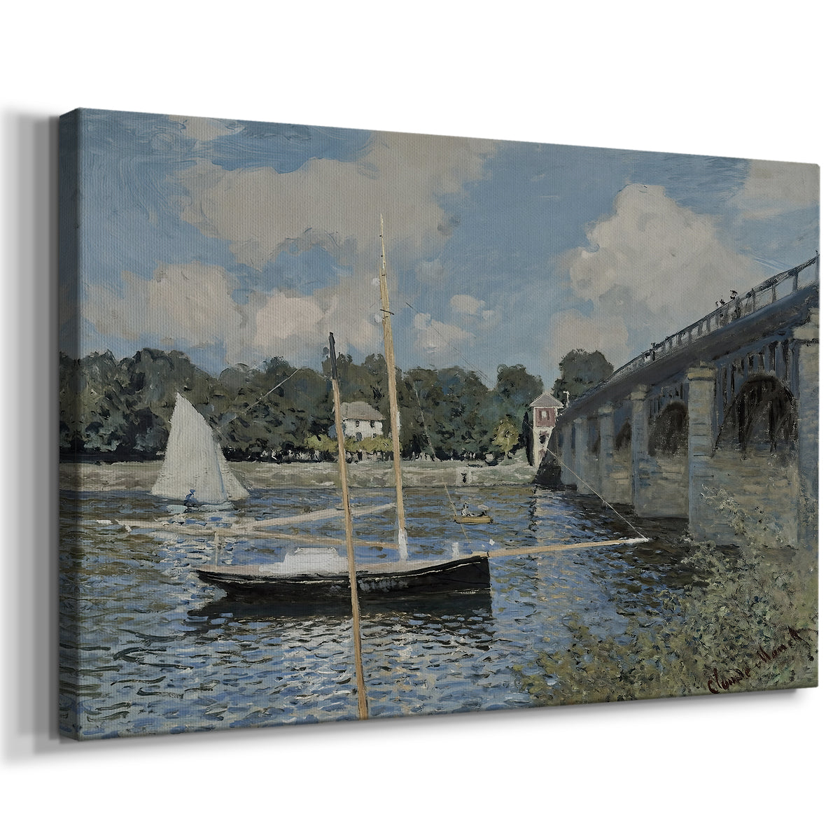 Canvas art print featuring an impressionist river scene with bridge and boats beneath open sky, displayed at an angle