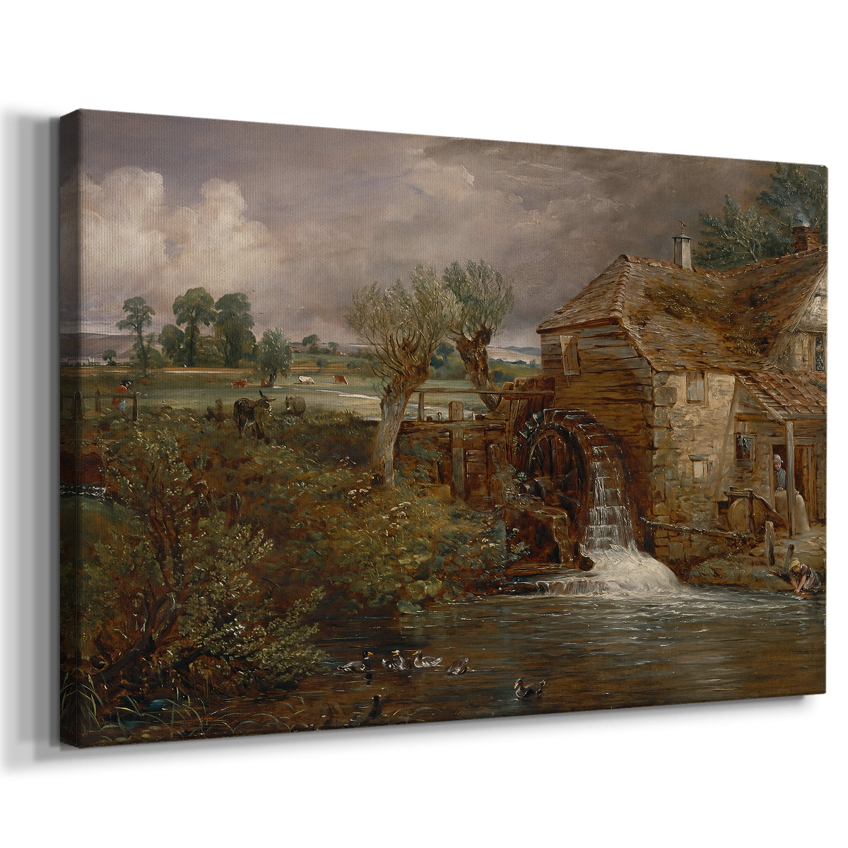 Canvas art print featuring a countryside scene with mill, displayed at an angle