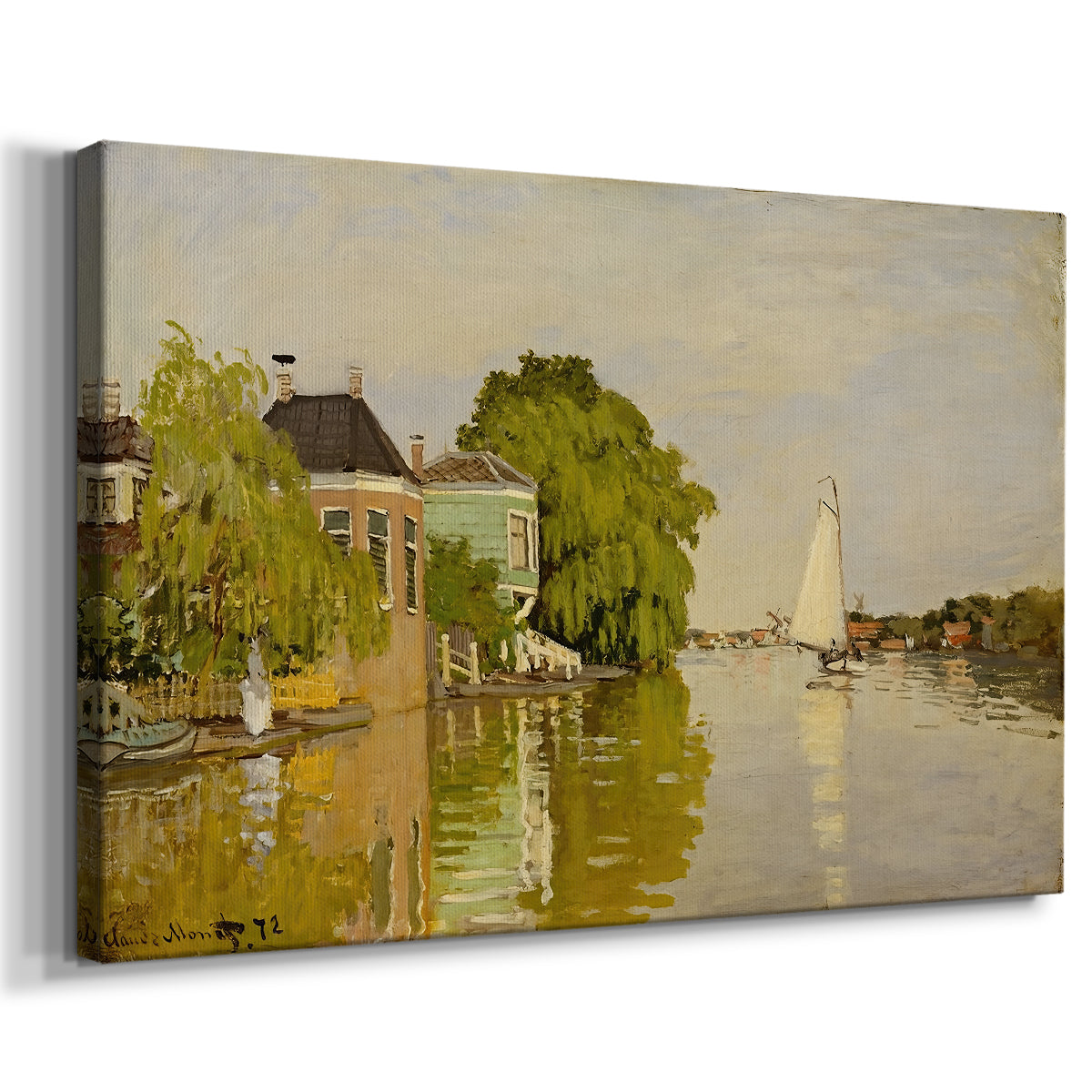 Canvas art print featuring riverside homes with trees and mirrored reflections in water, displayed at an angle