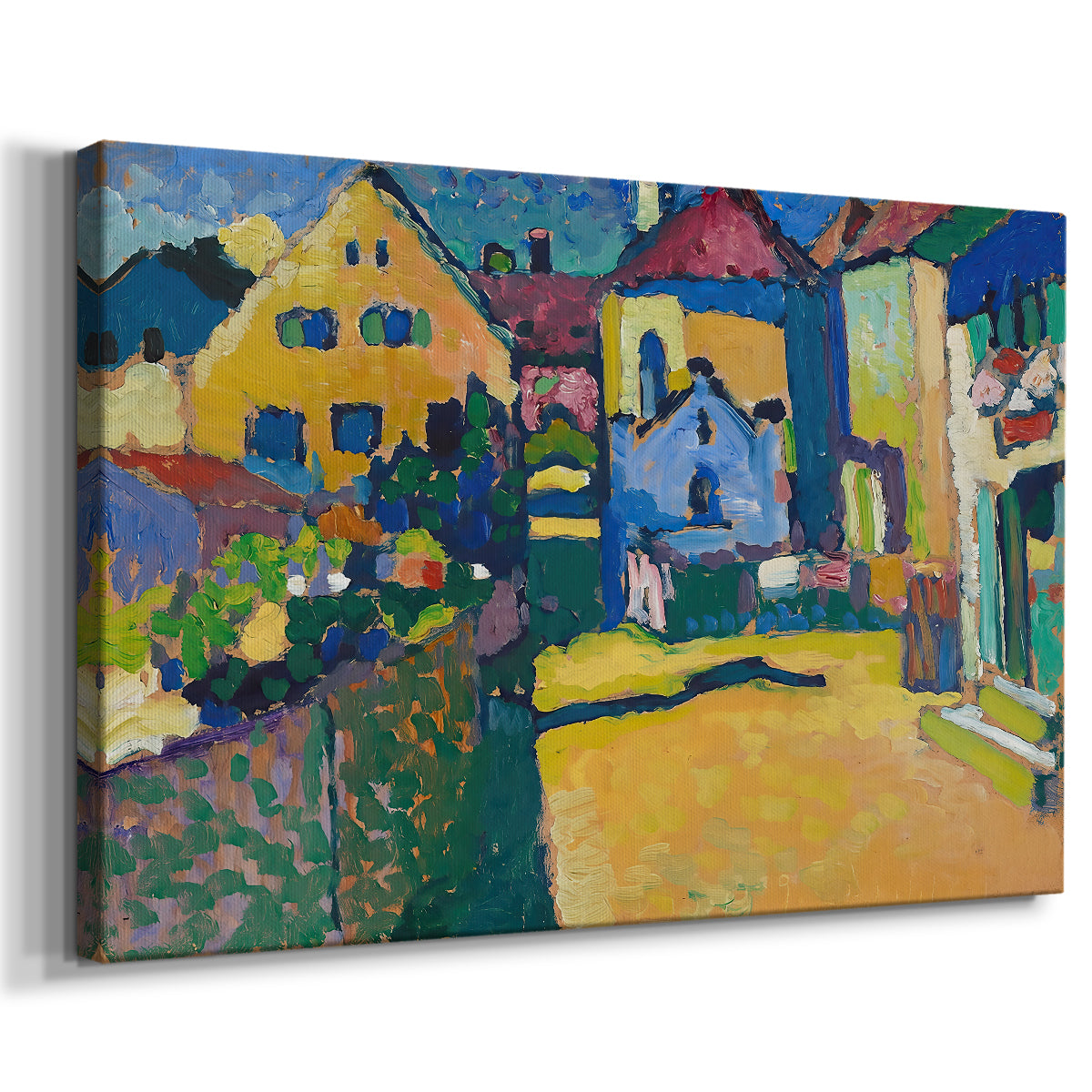 Canvas art print featuring a bright landscape showing buildings along a path with strong color contrast, displayed at an angle