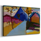 Canvas art print featuring a semi-abstract village view with angular structures and bright tones, displayed at an angle