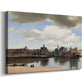 Canvas art print featuring an urban landscape with waterfront and architecture, displayed at an angle
