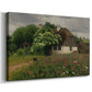 Canvas art print featuring a rural home set within blooming countryside landscape, displayed at an angle