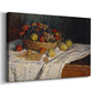 Canvas art print featuring an impressionist still life of fruit placed on cloth-covered surface, displayed at an angle