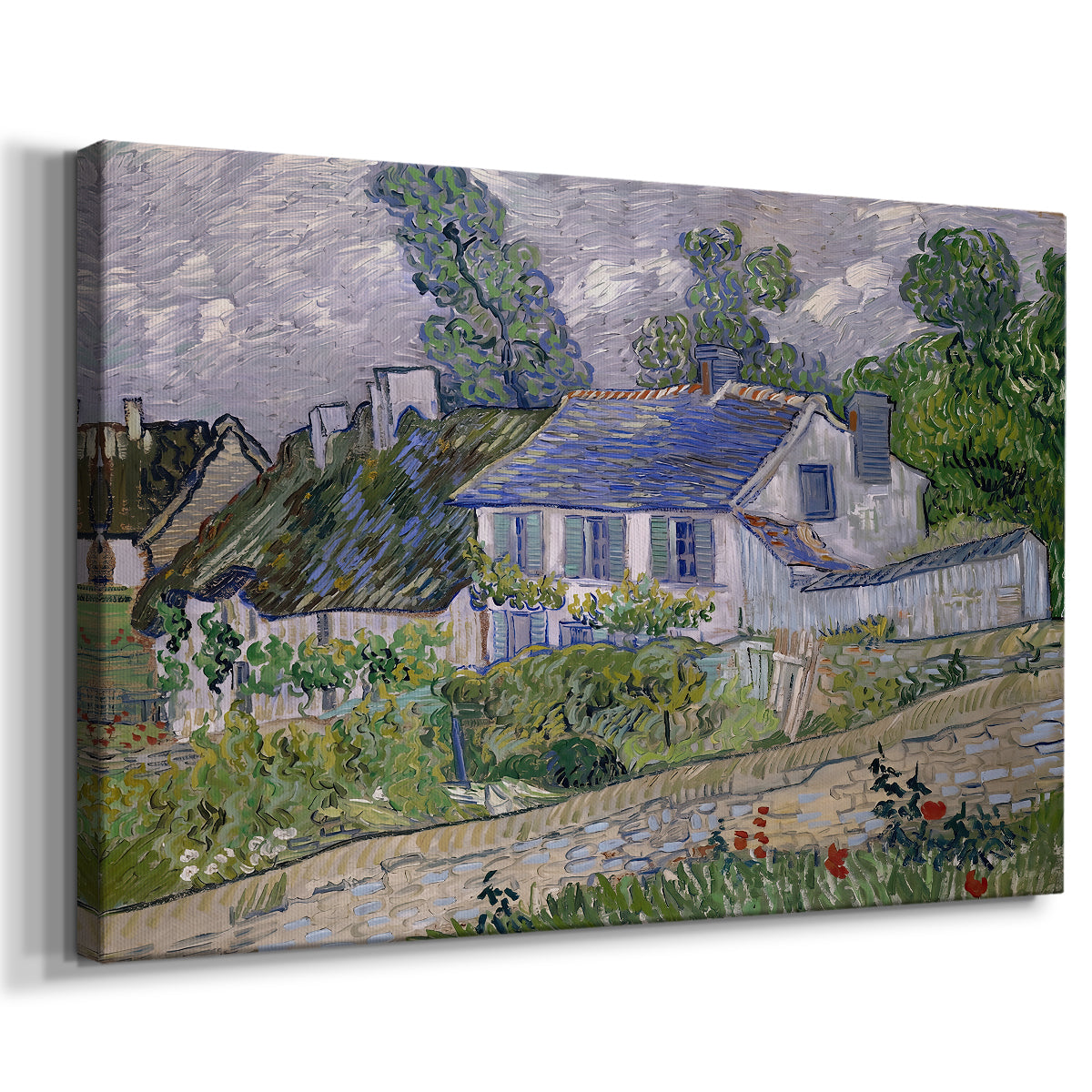 Canvas art print featuring an expressive village scene with buildings and natural surroundings, displayed at an angle