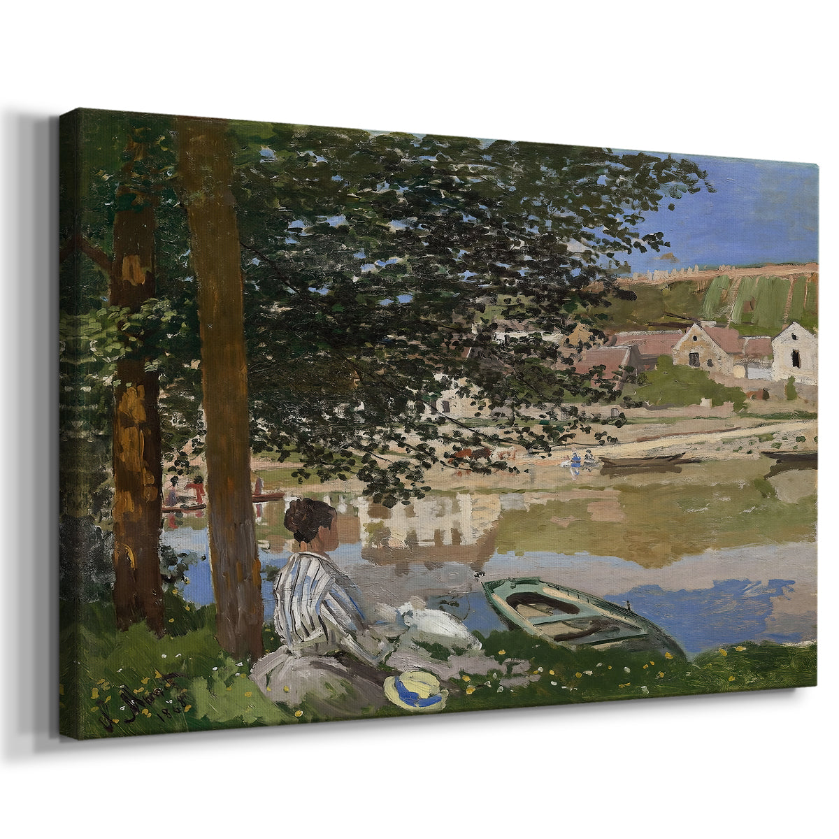 Canvas art print featuring a peaceful riverside scene with figures resting in grassy area by water, displayed at an angle