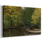 Canvas art print featuring a peaceful outdoor scene with child fishing near riverbank, displayed at an angle