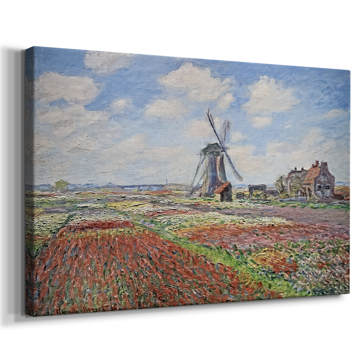 Canvas art print featuring a vibrant agricultural landscape with flowers and windmill, displayed at an angle