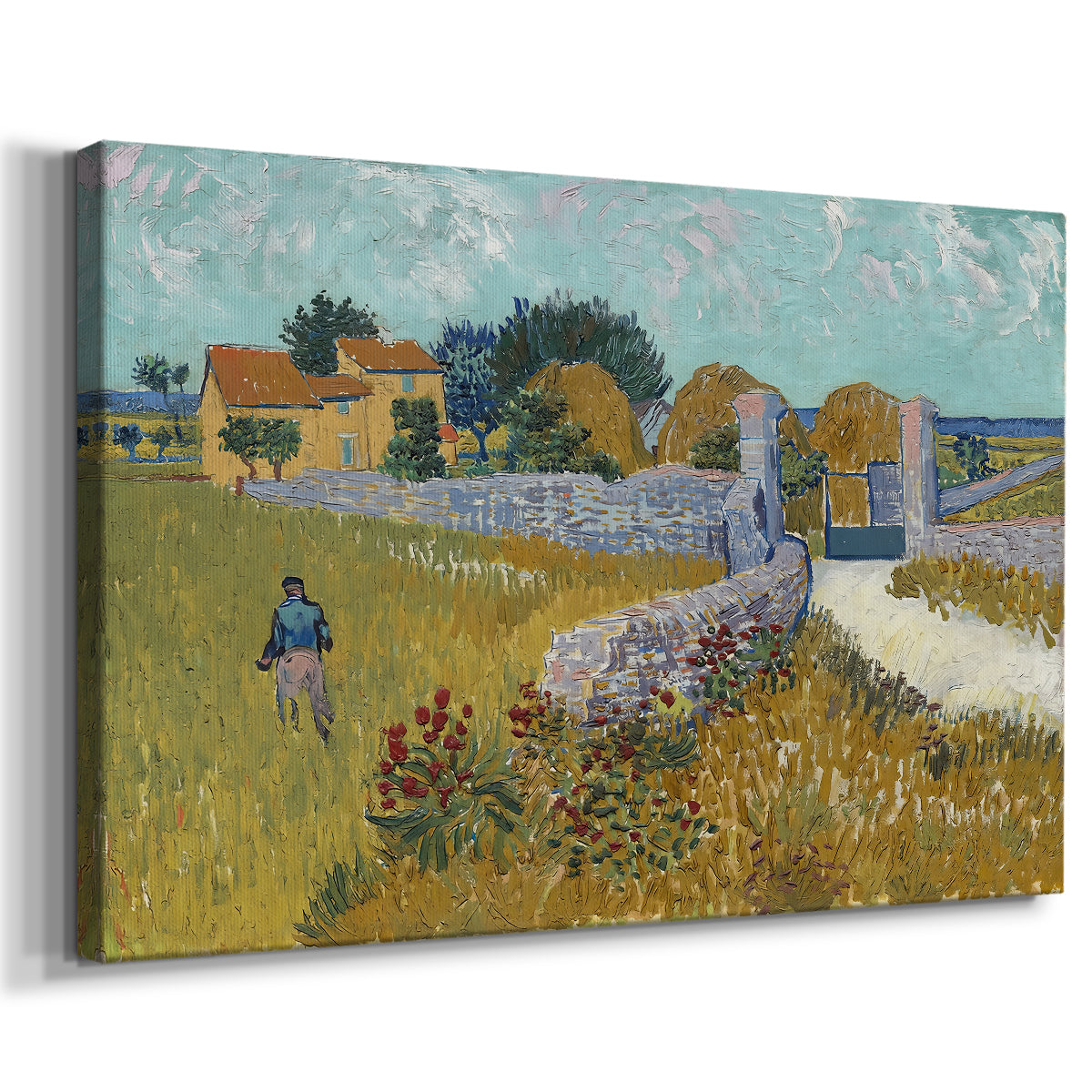 Canvas art print featuring a rural scene with building set within cultivated land, displayed at an angle