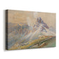 Canvas art print featuring an alpine scene with jagged rock formations and distant mountains, displayed at an angle