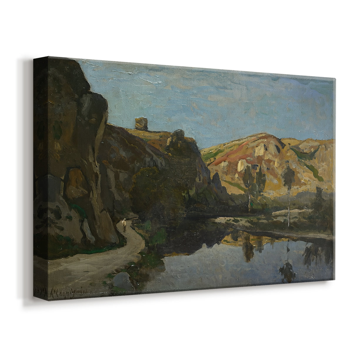 Canvas art print featuring a natural landscape with water and elevated rock formations, displayed at an angle