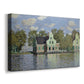 Canvas art print featuring an impressionist riverside village with colorful buildings, displayed at an angle