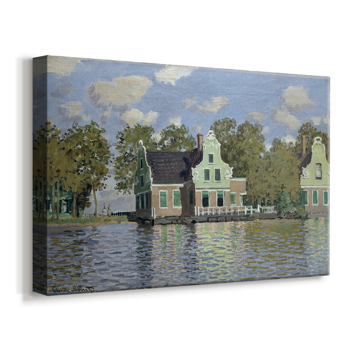 Canvas art print featuring an impressionist riverside village with colorful buildings, displayed at an angle