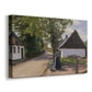 Canvas art print featuring an everyday rural interaction on quiet street with buildings, displayed at an angle