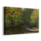 Canvas art print featuring a peaceful outdoor scene with child fishing near riverbank, displayed at an angle