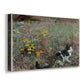 Canvas art print featuring a small cat resting among colorful flowers in grassy field, displayed at an angle