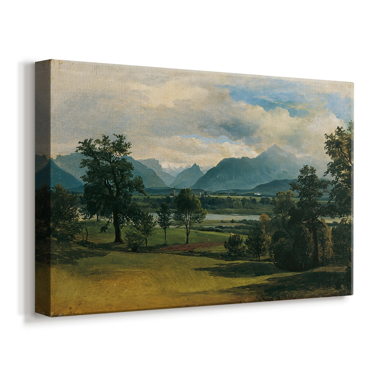 Canvas art print featuring a pastoral scene with distant buildings and natural terrain, displayed at an angle