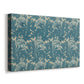 Canvas art print featuring a decorative textile design with stylized flowers and leaves, displayed at an angle