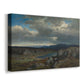 Canvas art print featuring an expansive natural scene with hills and distant peaks, displayed at an angle