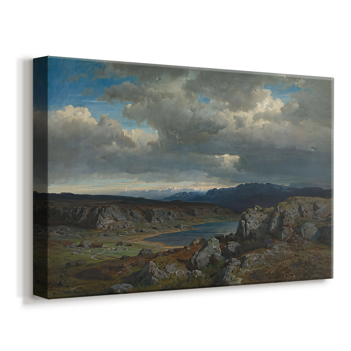 Canvas art print featuring an expansive natural scene with hills and distant peaks, displayed at an angle
