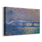 Canvas art print featuring an urban landscape with bridge and water rendered in blurred tones, displayed at an angle