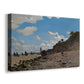 Canvas art print featuring an impressionist seaside with people and sailboats under bright sky, displayed at an angle