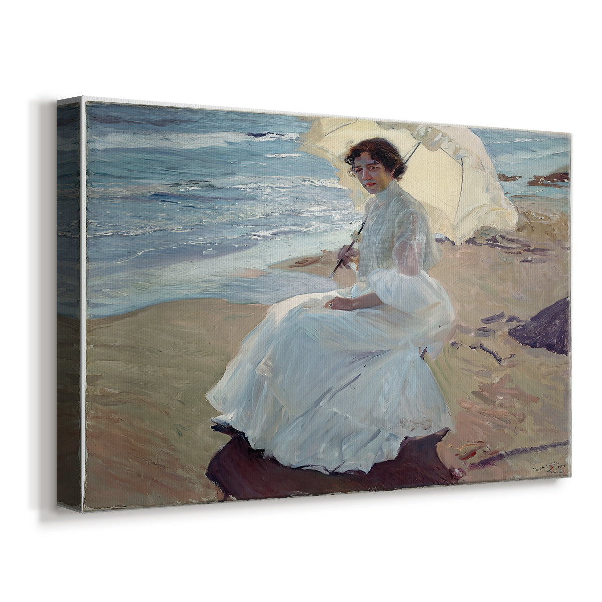 Canvas art print featuring a sunlit coastal portrait of woman near shoreline, displayed at an angle