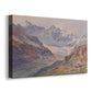 Canvas art print featuring a mountain scene with glacier stretching through rocky valley, displayed at an angle
