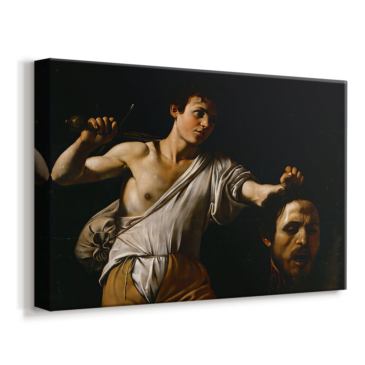 Canvas art print featuring a biblical scene of David gripping Goliath's head with dramatic lighting, displayed at an angle