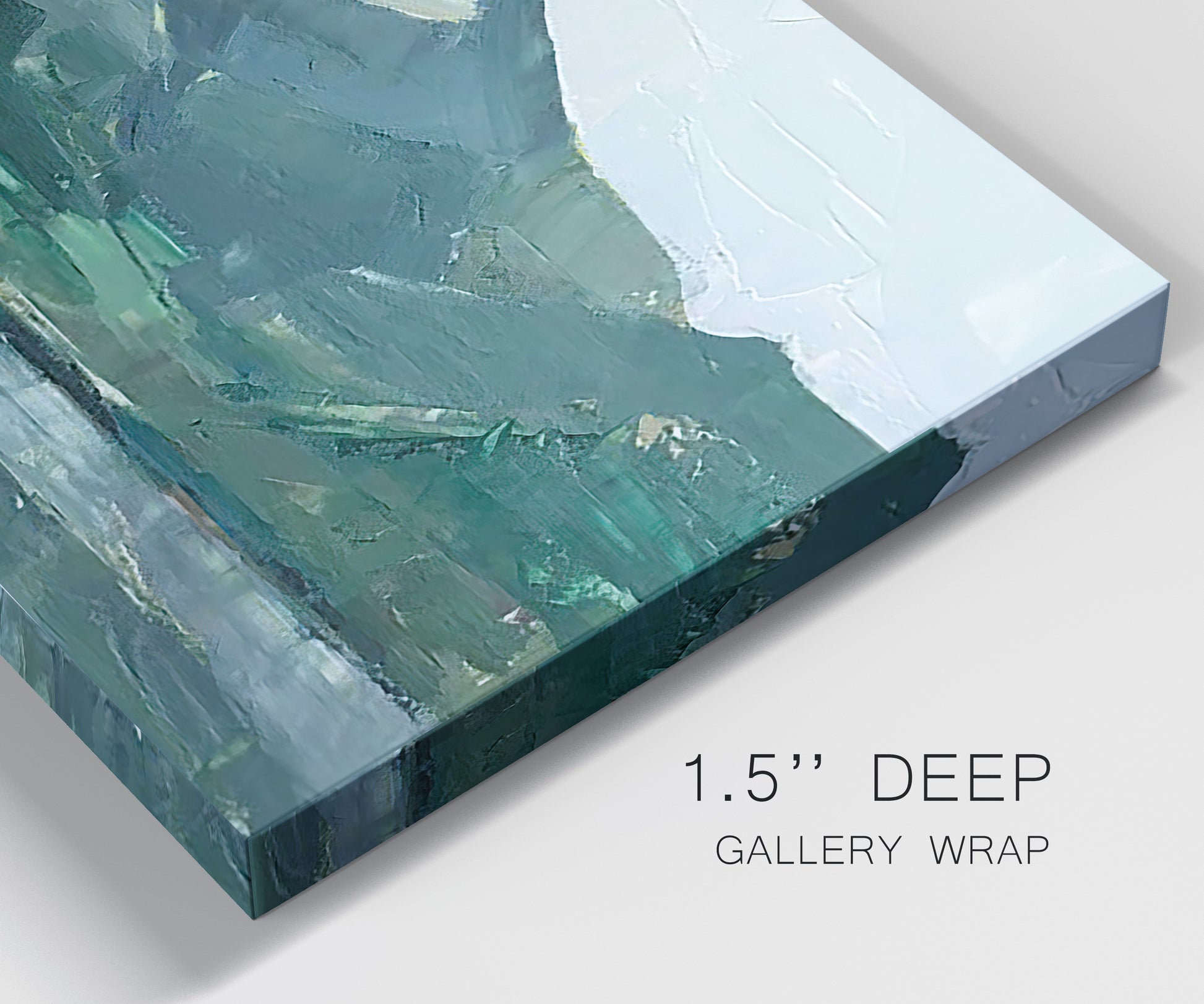Close-up view of wrapped canvas corner featuring muted mountain range in grey tones.