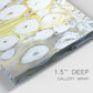 Close-up view of wrapped canvas corner featuring vintage inspired floral abstraction.