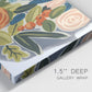 Close-up view of wrapped canvas corner featuring colorful botanical illustration.
