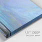 Close-up view of wrapped canvas corner featuring coastal shoreline with gentle surf.