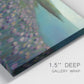 Close-up view of wrapped canvas corner featuring calm coastal landscape sanctuary.
