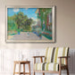 Impressionist residential landscape at Argenteuil by Claude Monet in an ornate champagne frame displayed in a light-toned interior setting.