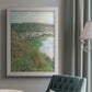 Impressionist landscape view of Vétheuil by Claude Monet in an {frame_style_descriptor} displayed in a neutral interior setting.