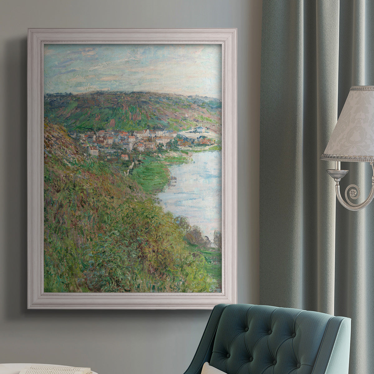 Impressionist landscape view of Vétheuil by Claude Monet in an {frame_style_descriptor} displayed in a neutral interior setting.