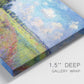 Close-up view of wrapped canvas corner featuring sunlit meadow landscape.