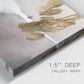 Close-up view of wrapped canvas corner featuring abstract watercolor with gold accents.