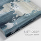 Close-up view of wrapped canvas corner featuring golden coastal sunset with cliffs.