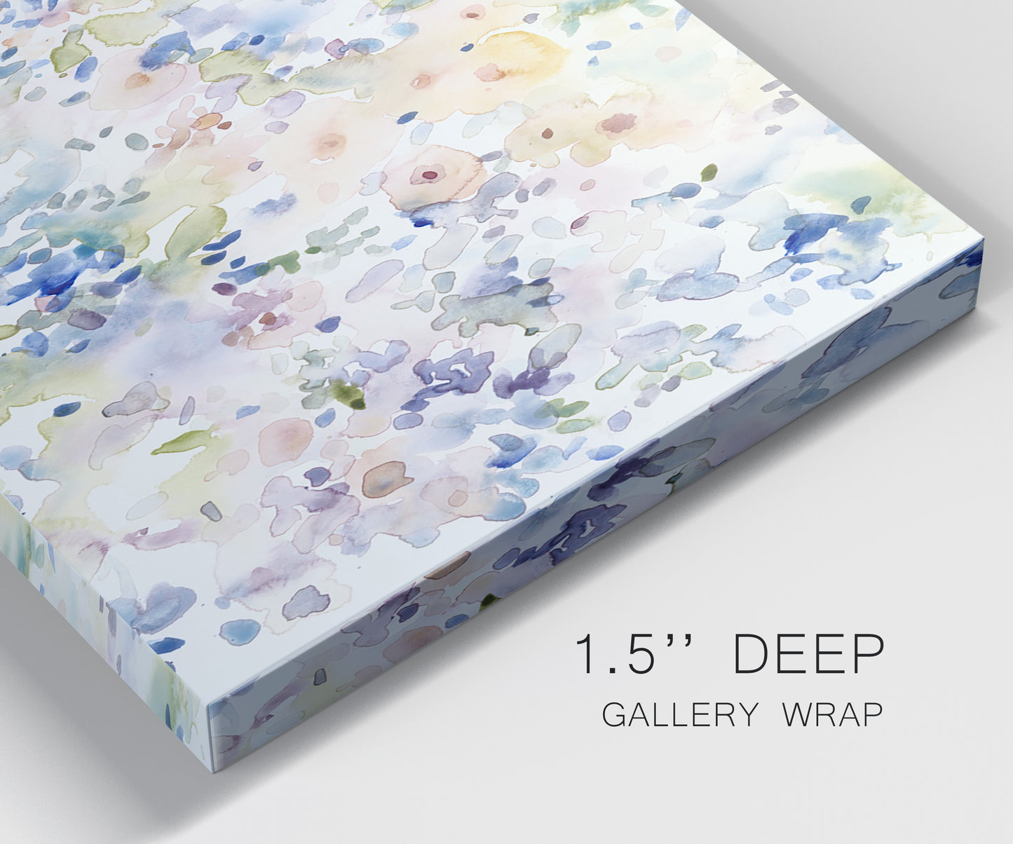 Close-up view of wrapped canvas corner featuring flowing abstract watercolor.