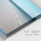 Close-up view of wrapped canvas corner featuring white sand beach with gentle waves.