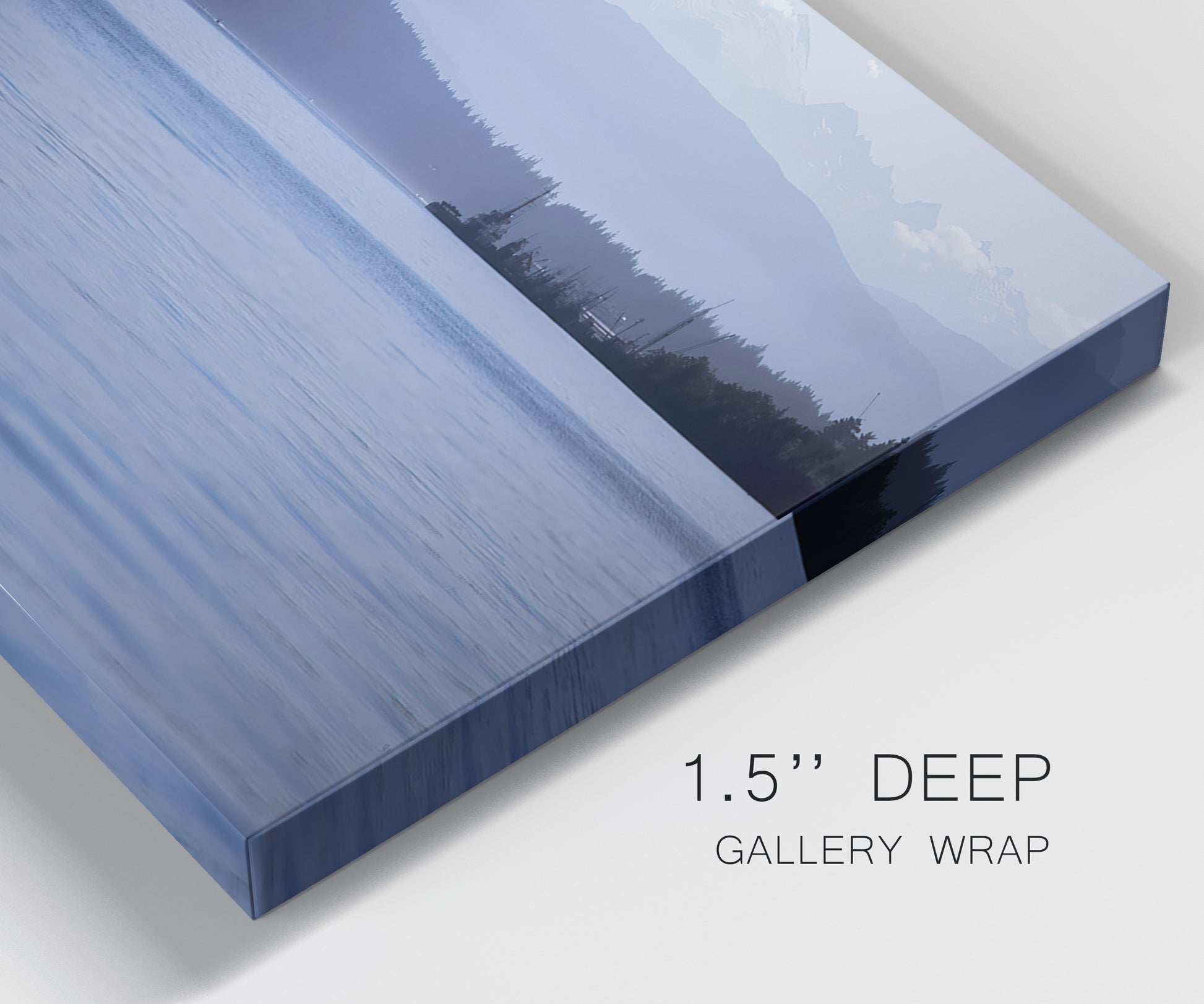 Close-up view of wrapped canvas corner featuring calm blue water landscape.