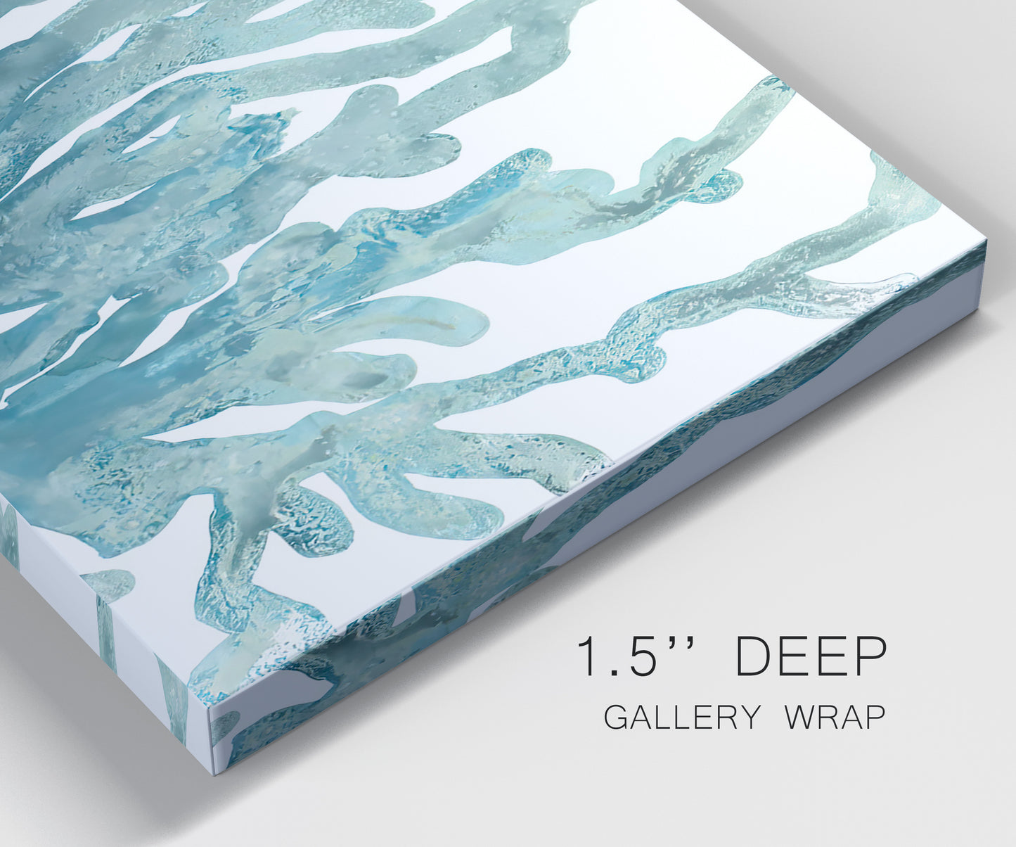 Close-up view of wrapped canvas corner featuring blue coral inspired watercolor.