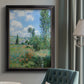 Impressionist pastoral landscape with poppy fields by Claude Monet in an {frame_style_descriptor} displayed in a neutral interior setting.